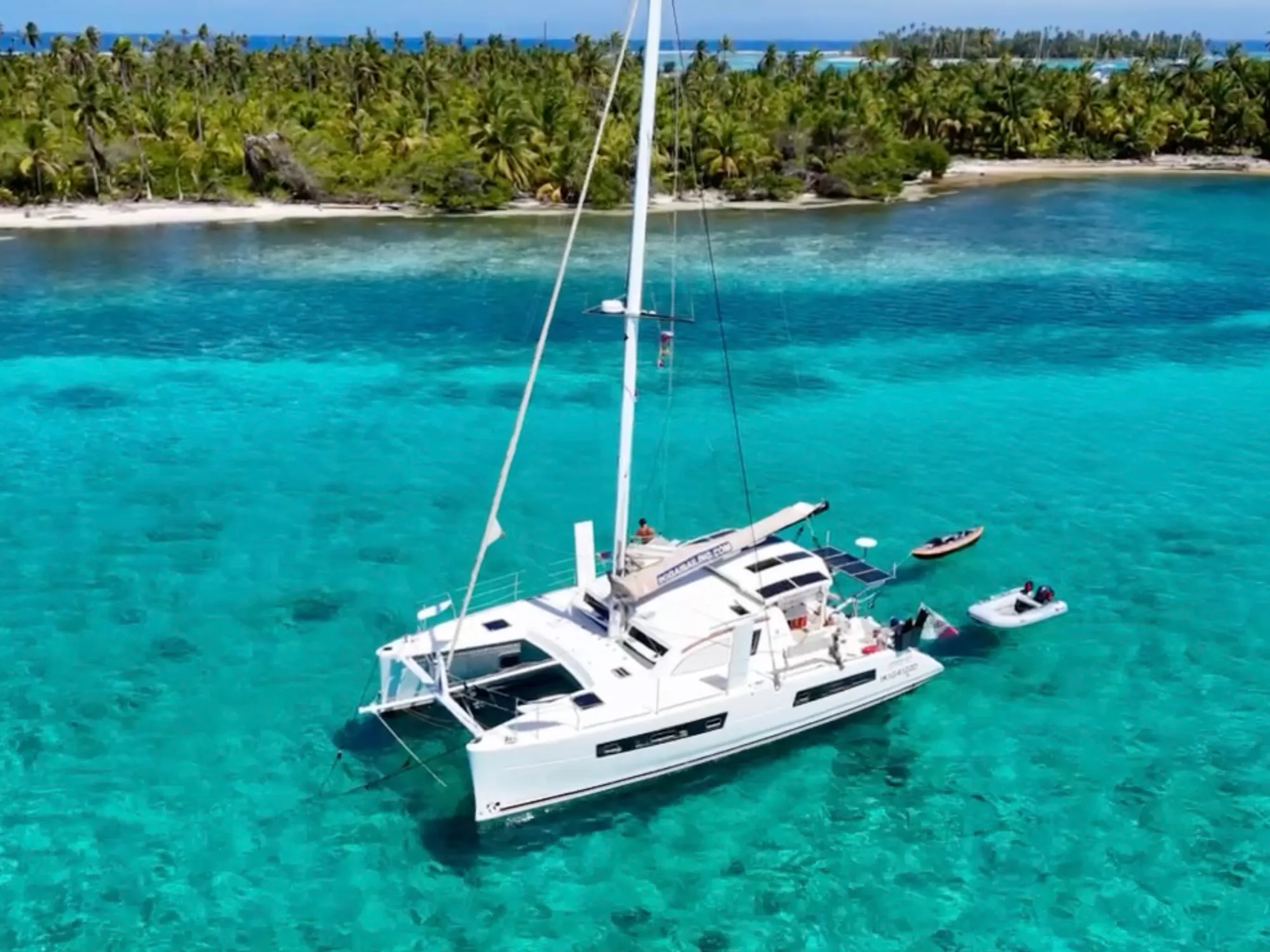 Aerial view of the Catana 47 anchored in the turquoise water of the San Blas islands, Guna Yala